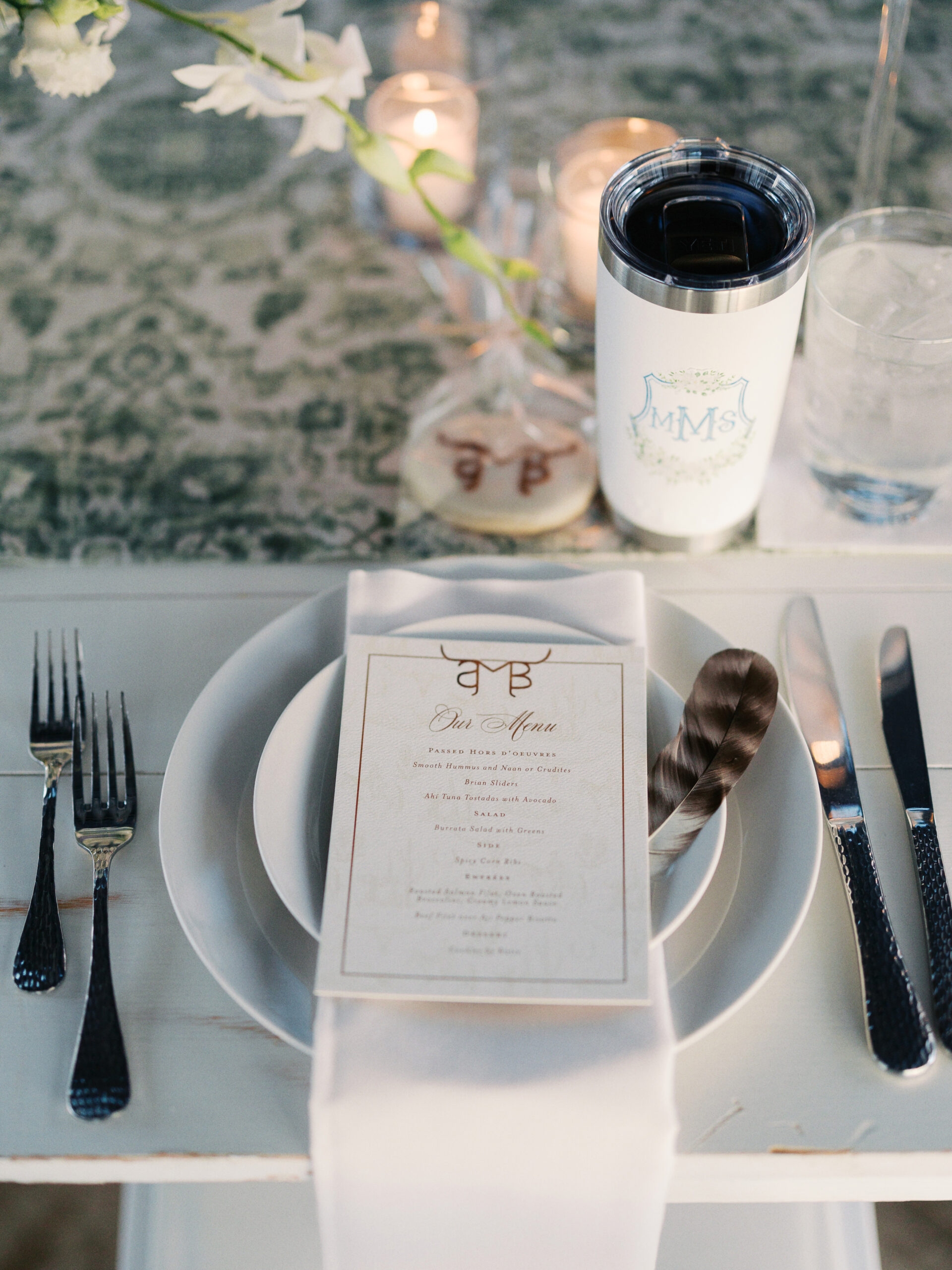 Elegant Olive & Eden wedding tablescape with custom menu, fine china, and thoughtful guest favor, showcasing personalized wedding design details.