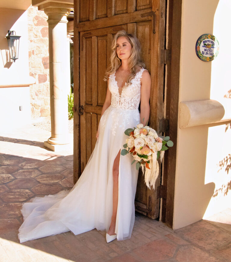 Portrait of a bride at a stone Texas Hill Country venue, representing the peace of mind provided by Olive & Eden's wedding management and month-of coordination.